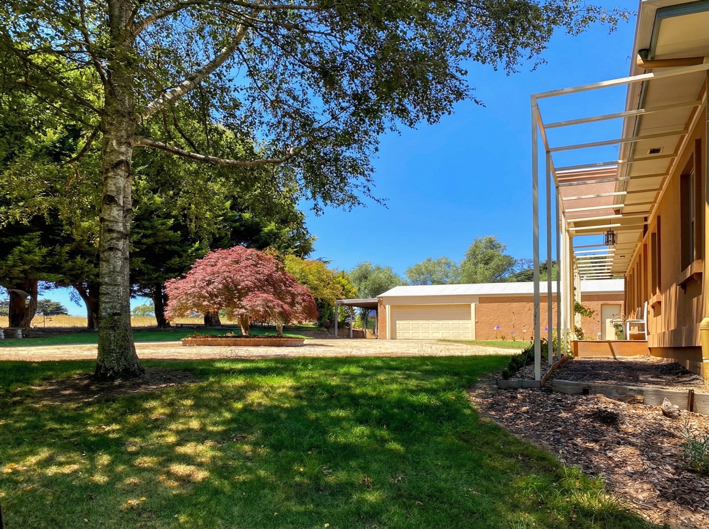 Front garden and approach to lifestyle residence